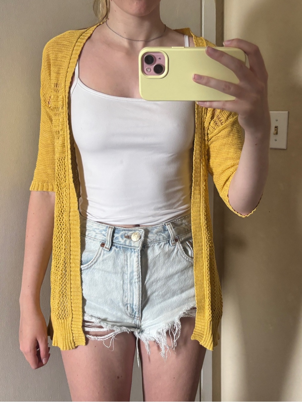 Open yellow knit cardigan